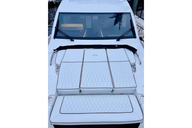 La Vida Boca Yacht Photos Pics 2019 Sealine F430 yacht with luxurious white cushioned deck and sleek windshield.