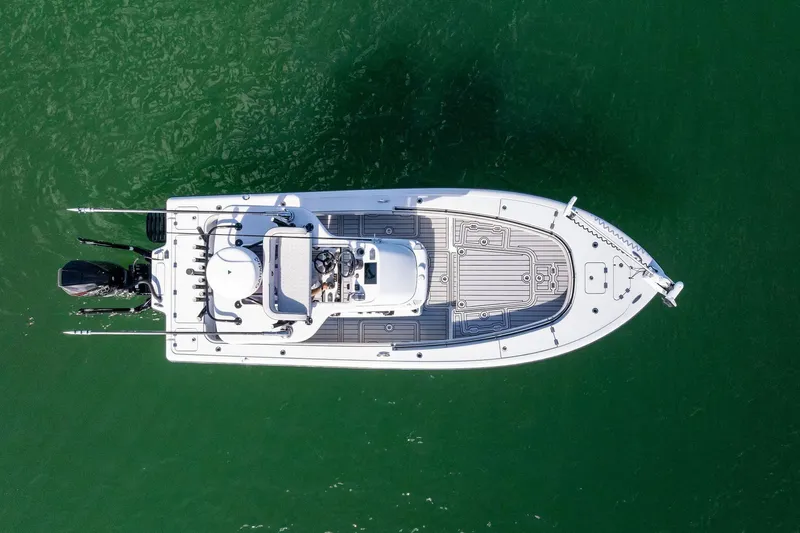  Yacht Photos Pics Aerial view of 2020 Barker Boatworks 26 Open on green water.