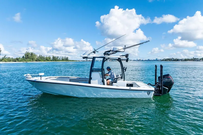  Yacht Photos Pics 2020 Barker Boatworks 26 Open on calm water under a clear blue sky.