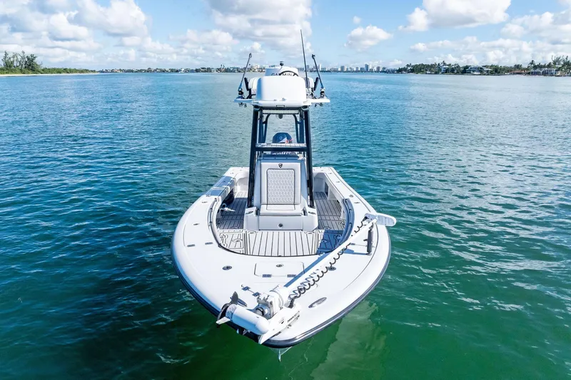  Yacht Photos Pics 2020 Barker Boatworks 26 Open on calm water under a blue sky.