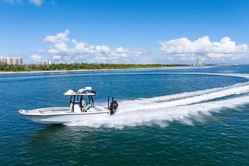  Yacht Photos Pics 2020 Barker Boatworks 26 Open cruising on clear blue water under a sunny sky.