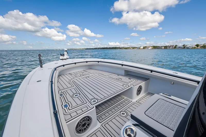  Yacht Photos Pics 2020 Barker Boatworks 26 Open on water, featuring spacious deck and scenic view.