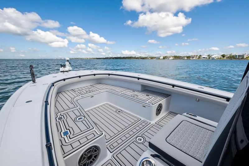  Yacht Photos Pics 2020 Barker Boatworks 26 Open on water, featuring spacious deck and scenic view.