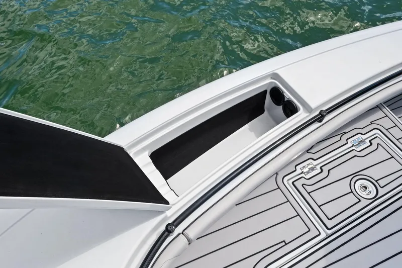  Yacht Photos Pics 2020 Barker Boatworks 26 Open deck detail with storage compartment and cup holders.