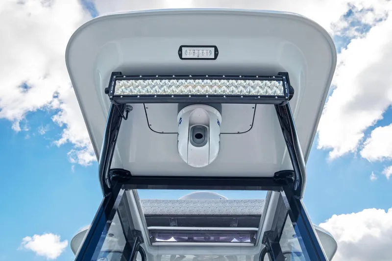  Yacht Photos Pics 2020 Barker Boatworks 26 Open T-top with LED lights against blue sky.