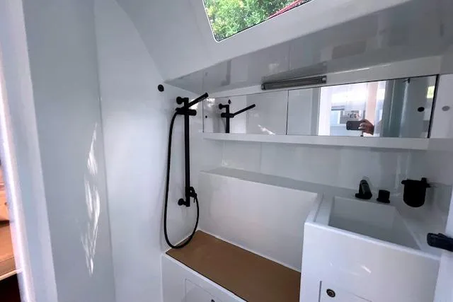 Bellissimo Yacht Photos Pics Modern bathroom interior in 2024 Neo 43 Romo, featuring sleek fixtures and minimalist design.