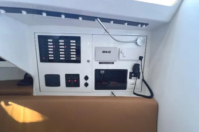 Bellissimo Yacht Photos Pics Control panel of Neo 43 Romo 2024 yacht with navigation and communication equipment.
