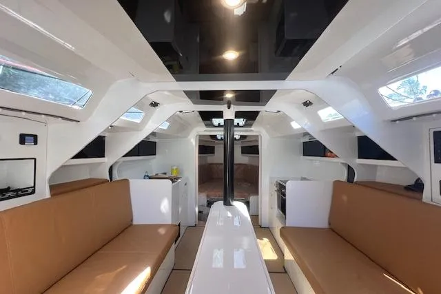 Bellissimo Yacht Photos Pics Interior of 2024 Neo 43 Romo yacht with modern design and brown seating.