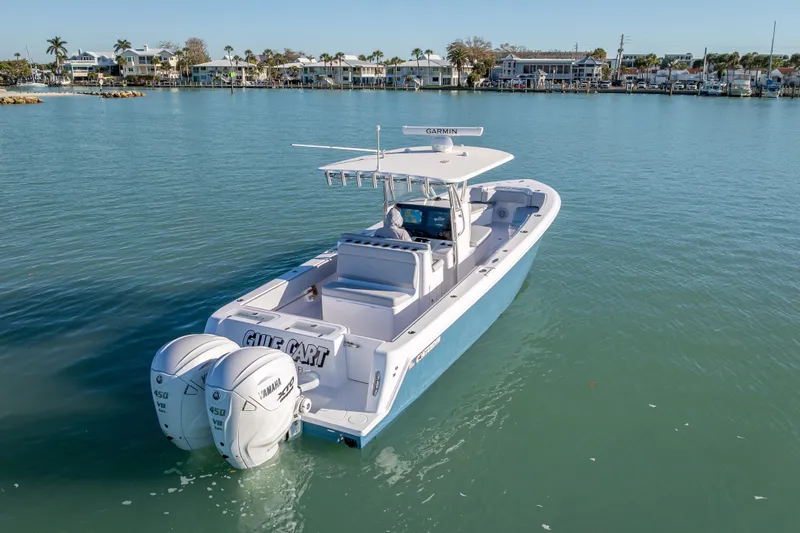  Yacht Photos Pics 2026 Contender 35 ST boat with twin Yamaha engines on calm water.