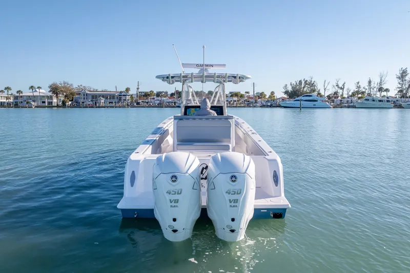  Yacht Photos Pics 2026 Contender 35 ST boat with twin 450 V8 engines on calm water.