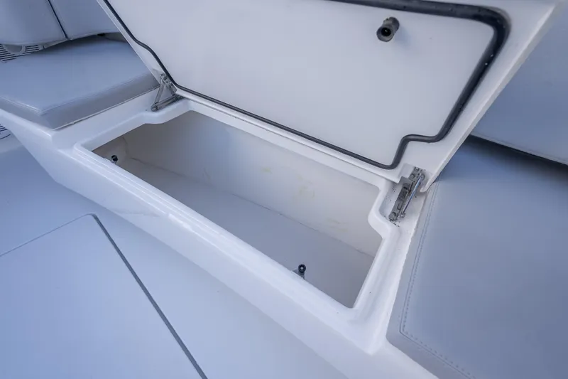  Yacht Photos Pics Open storage compartment on 2026 Contender 35 ST boat, showcasing interior space.