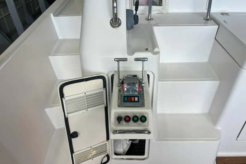 Dream Catcher Yacht Photos Pics Control panel and steps on a 1998 West Bay 58 yacht.