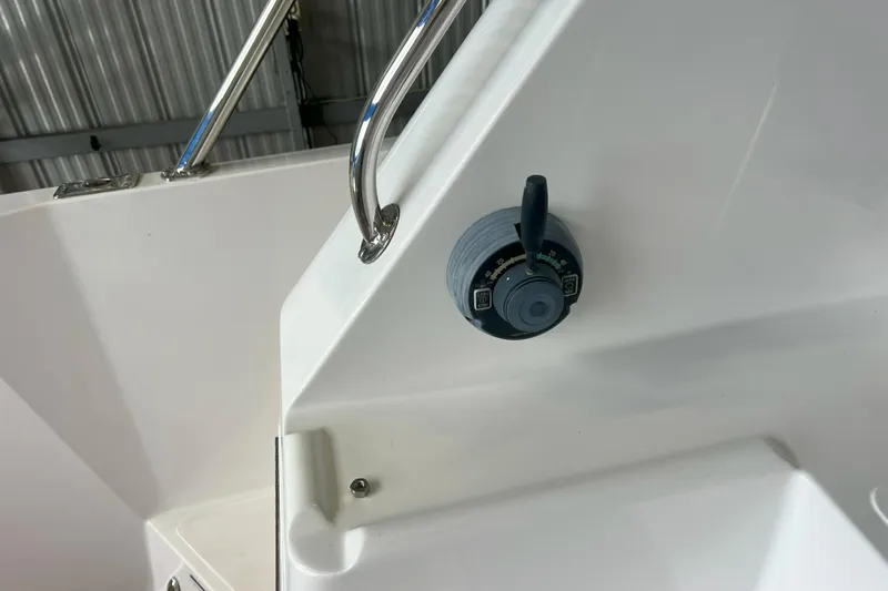 Dream Catcher Yacht Photos Pics Control panel on a 1998 West Bay 58 yacht, featuring a lever and dial.