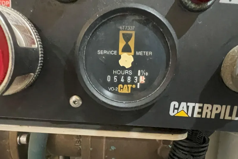 Dream Catcher Yacht Photos Pics Caterpillar service meter showing 5483 hours on a West Bay 58, 1998 model.