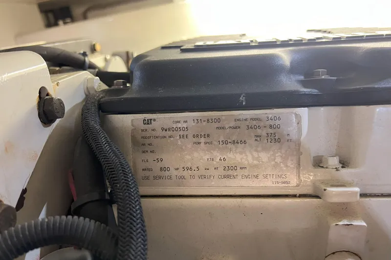 Dream Catcher Yacht Photos Pics Engine label on a 1998 West Bay 58, featuring CAT model 3406 specifications.