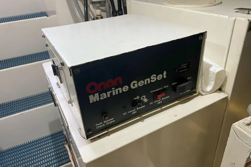 Dream Catcher Yacht Photos Pics Onan Marine GenSet in 1998 West Bay 58 yacht engine room.