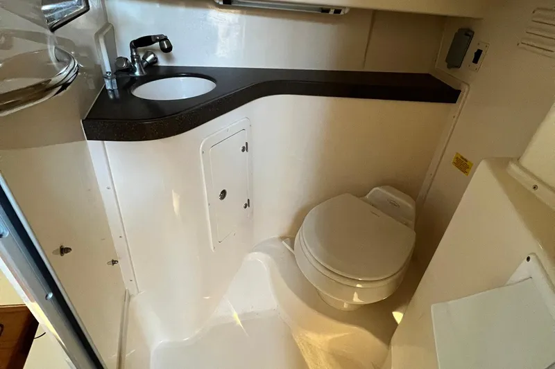 Zig Zag Yacht Photos Pics 2004 Grady-White Express 330 boat bathroom with sink and toilet.