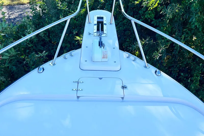 Zig Zag Yacht Photos Pics Bow of 2004 Grady-White Express 330 boat with stainless steel railings.