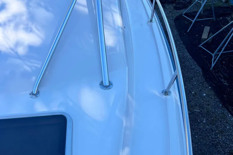 Zig Zag Yacht Photos Pics 2004 Grady-White Express 330 boat deck with stainless steel railings.