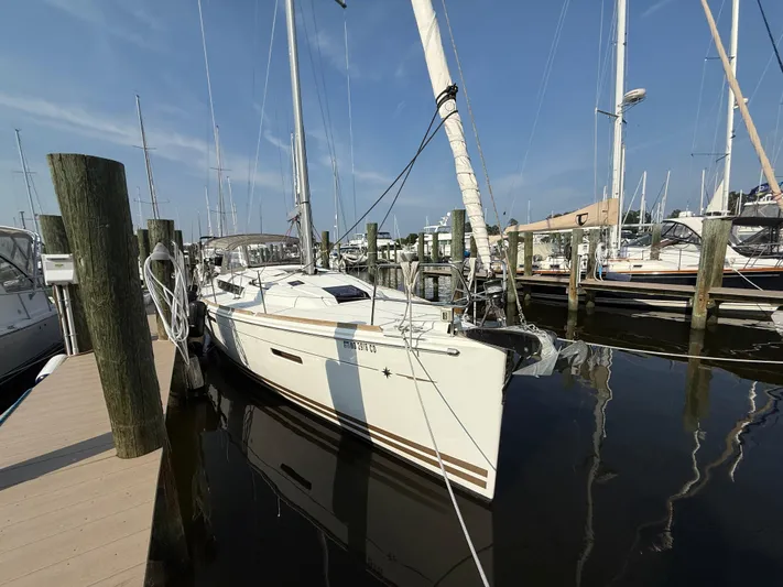 Ma Bro Yacht Photos Pics 2014 Jeanneau Sun Odyssey 409 sailboat docked at marina.