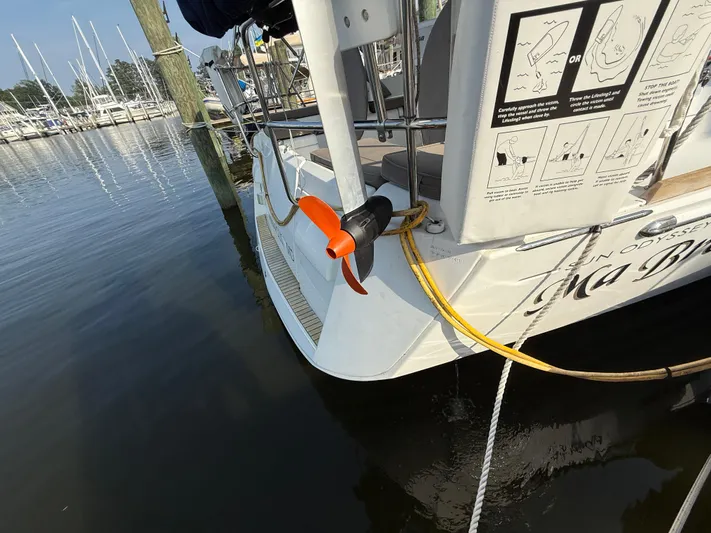 Ma Bro Yacht Photos Pics 2014 Jeanneau Sun Odyssey 409 docked, showing stern with safety equipment and mooring lines.