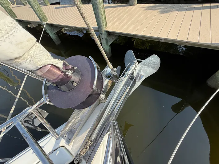 Ma Bro Yacht Photos Pics Bow of 2014 Jeanneau Sun Odyssey 409 sailboat with anchor and dock view.