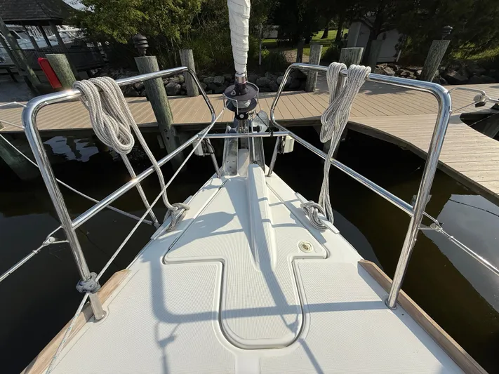 Ma Bro Yacht Photos Pics Bow of 2014 Jeanneau Sun Odyssey 409 sailboat docked at marina.