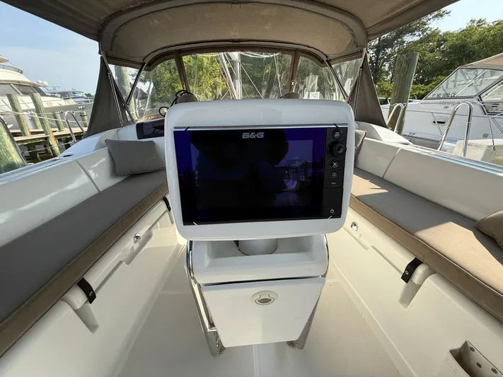 Ma Bro Yacht Photos Pics Cockpit of 2014 Jeanneau Sun Odyssey 409 sailboat with navigation equipment.