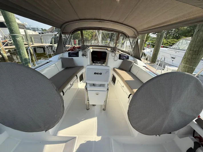 Ma Bro Yacht Photos Pics Cockpit of 2014 Jeanneau Sun Odyssey 409 sailboat with seating and navigation equipment.