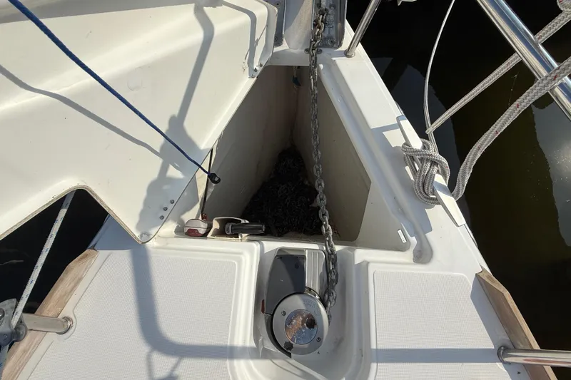 Ma Bro Yacht Photos Pics Anchor locker of 2014 Jeanneau Sun Odyssey 409 sailboat, featuring chain and winch.
