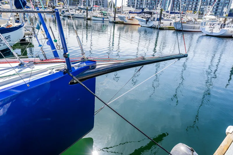 Manifest Yacht Photos Pics Sleek 2016 Offshore Racing Van Munster Boats Fred Barrett 35 docked in marina.