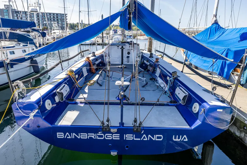 Manifest Yacht Photos Pics Blue Offshore Racing sailboat, Van Munster Boats Fred Barrett 35, docked at Bainbridge Island marina.