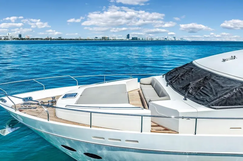 Princess Y85 Yacht Photos Pics Luxurious 2012 Princess 85 yacht on serene blue waters with city skyline.