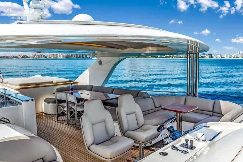 Princess Y85 Yacht Photos Pics Luxurious 2012 Princess 85 yacht interior with ocean view, featuring plush seating and modern amenities.