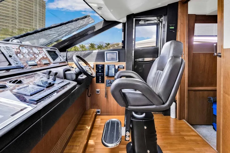 Princess Y85 Yacht Photos Pics Luxurious 2012 Princess 85 yacht helm with modern controls and leather captain's chair.