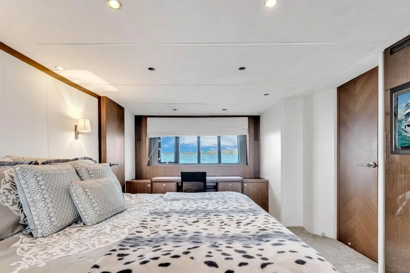 Princess Y85 Yacht Photos Pics Luxurious bedroom interior on a 2012 Princess 85 yacht with ocean view.