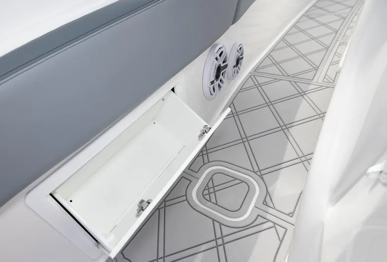  Yacht Photos Pics 2024 Deep Impact 369 boat interior with open storage compartment and patterned flooring.