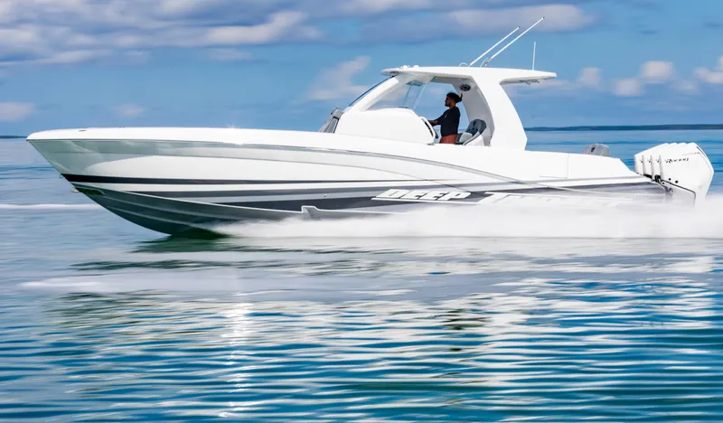  Yacht Photos Pics 2024 Deep Impact 369 Deep Impact boat cruising on water.