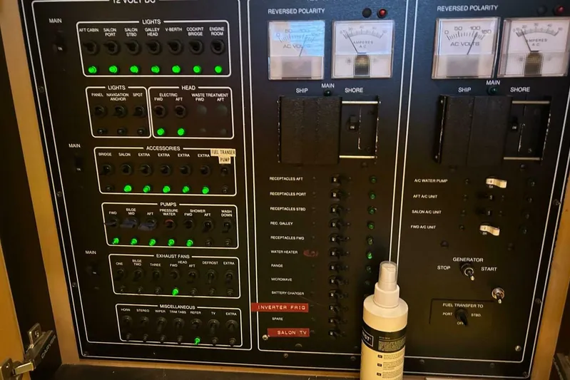 Contentment Yacht Photos Pics Control panel of a 1995 Carver 440 Aft Cabin Motor Yacht with switches and meters.