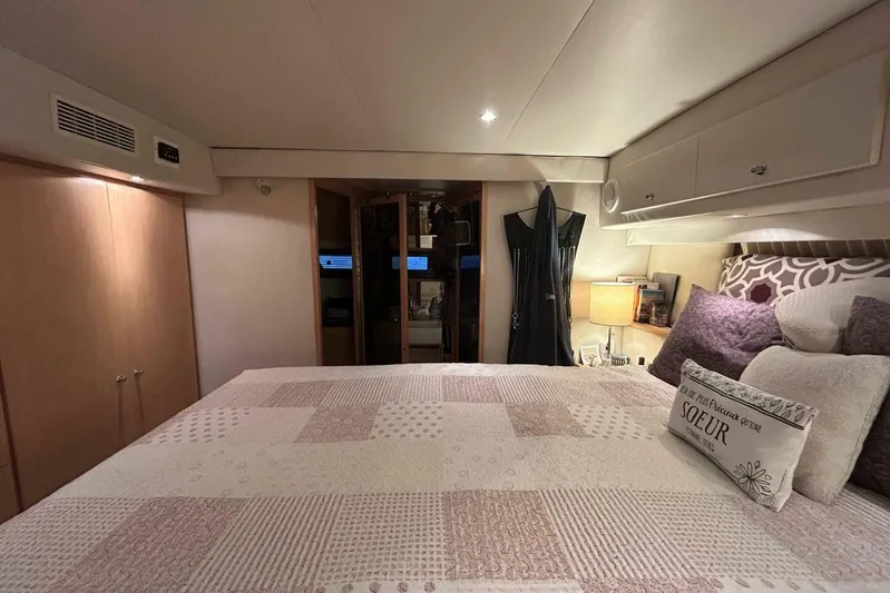 Contentment Yacht Photos Pics Luxurious bedroom interior of 1995 Carver 440 Aft Cabin Motor Yacht.