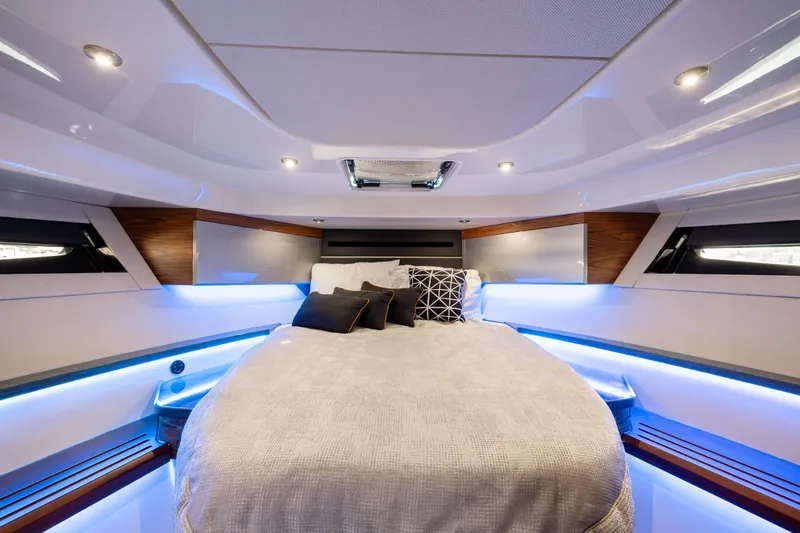 New Trade-in- All Offers & Trades Welcome Yacht Photos Pics Luxurious cabin interior of 2021 Boston Whaler 405 Conquest with ambient lighting.