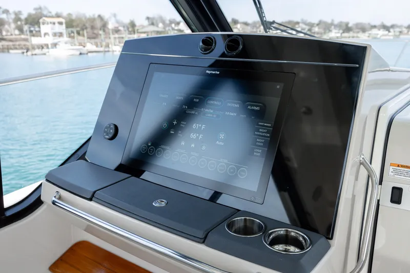 New Trade-in- All Offers & Trades Welcome Yacht Photos Pics Boston Whaler 405 Conquest 2021 helm with touchscreen display.