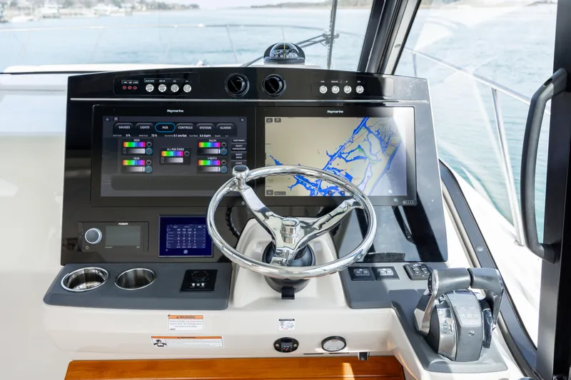 New Trade-in- All Offers & Trades Welcome Yacht Photos Pics Boston Whaler 405 Conquest 2021 helm with navigation system.