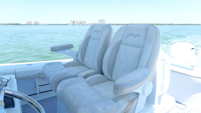  Yacht Photos Pics 2016 Yellowfin 32 Offshore boat seats with ocean view in background.