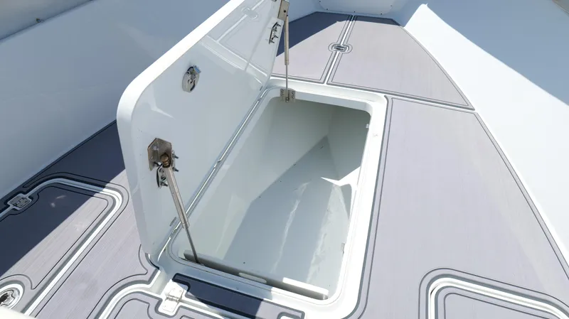  Yacht Photos Pics Open storage compartment on 2016 Yellowfin 32 Offshore boat deck.