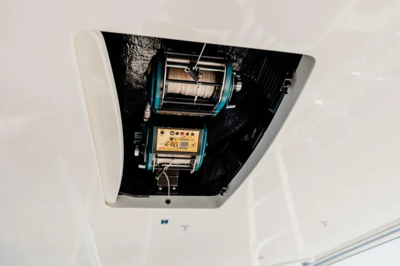 C Student Yacht Photos Pics Fishing reel mechanism on 2017 Viking 66 Convertible yacht ceiling.