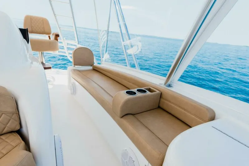 C Student Yacht Photos Pics Luxurious seating on 2017 Viking 66 Convertible yacht with ocean view.