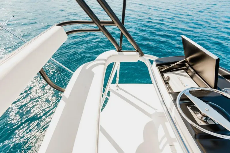 C Student Yacht Photos Pics Viking 66 Convertible 2017 yacht helm overlooking blue ocean waters.