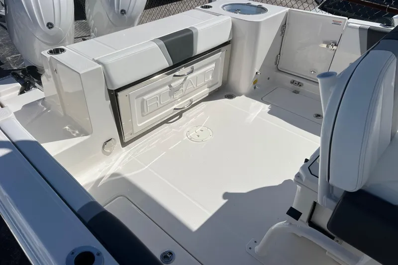  Yacht Photos Pics 2026 Robalo R250 Center Console boat interior with seating and storage.