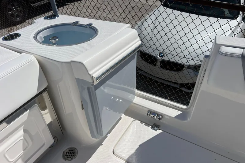  Yacht Photos Pics 2026 Robalo R250 Center Console boat interior with livewell and storage compartments.